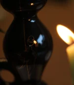 black candle holders side detail view