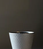 Side view of the silver-scaled ceramic cups rim