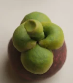 ceramic fruit decor-top-down view of a ceramic mangosteen