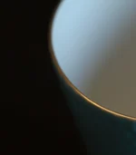 ceramic espresso cups​ detail view of the gold-rimmed cup edge