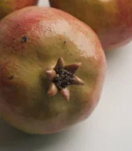 Hand-sculpted ceramic pomegranate dining table centerpiece by Jingee 02