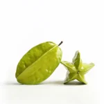 Hyper-realistic ceramic starfruit sculpture, whole and in cross-section