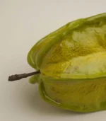 Modern Decor - Macro of the hand-carved ridges on a ceramic starfruit o1
