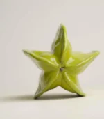 Modern Decor - Cross-section of a ceramic starfruit showing its five-point star