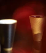 Image of gold and black sake cups