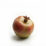 Hand-sculpted ceramic pomegranate dining table centerpiece by Jingee