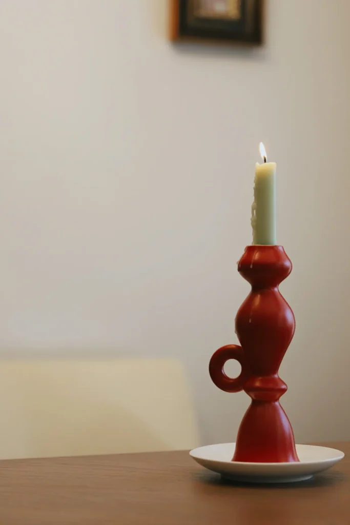 taper candle holders side view of a burning candle 01